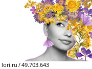 Abstract art collage of a young beautiful woman with flowers on her head. Conceptual fashion art design in a modern style. Стоковое фото, агентство Ingram Publishing / Фотобанк Лори