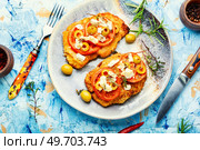 Chicken schnitzel with piece tomato, olives and cheese. Healthy keto. Top view. Tasty breaded chicken meat steaks. Стоковое фото, агентство Ingram Publishing / Фотобанк Лори