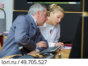 man with woman technician working with machine. Стоковое фото, агентство Ingram Publishing / Фотобанк Лори