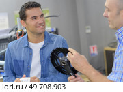 buying a bike part. Стоковое фото, агентство Ingram Publishing / Фотобанк Лори