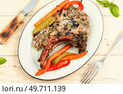 Roasted tomahawk pork meat steak on wooden table. rustic style. Top view. Grilled Tomahawk loin steak. Стоковое фото, агентство Ingram Publishing / Фотобанк Лори