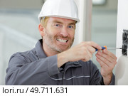 happy man working with tools. Стоковое фото, агентство Ingram Publishing / Фотобанк Лори