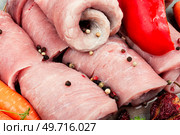 Fresh, uncooked pork meat rolls. Raw meat.. Raw pork, meat roll. Стоковое фото, агентство Ingram Publishing / Фотобанк Лори