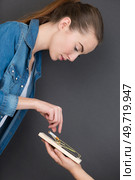 female reaching for cigarette in a mousetrap. Стоковое фото, агентство Ingram Publishing / Фотобанк Лори