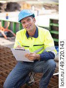 builder working on foundations at construction site. Стоковое фото, агентство Ingram Publishing / Фотобанк Лори
