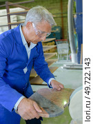 portrait of man in workshop. Стоковое фото, агентство Ingram Publishing / Фотобанк Лори