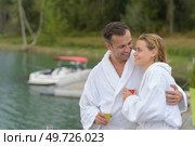 a couple in their bathrobes. Стоковое фото, агентство Ingram Publishing / Фотобанк Лори
