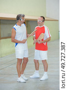 team of pala players talking. Стоковое фото, агентство Ingram Publishing / Фотобанк Лори