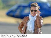 woman posing in front of the chopper. Стоковое фото, агентство Ingram Publishing / Фотобанк Лори