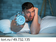 a man having trouble sleeping. Стоковое фото, агентство Ingram Publishing / Фотобанк Лори