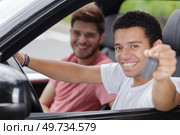 young man with the keys to the car. Стоковое фото, агентство Ingram Publishing / Фотобанк Лори