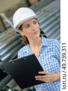 a female warehouse supply manager. Стоковое фото, агентство Ingram Publishing / Фотобанк Лори