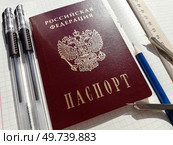 Экзамен по математике (ОГЭ, ЕГЭ): паспорт РФ, две черных гелиевых ручки, карандаш, линейка, кронциркуль, тетрадь в клетку. Стоковое фото, фотограф Ольга Дерябина / Фотобанк Лори