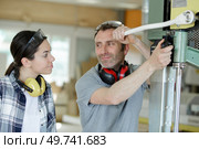 young attractive student of mechatronics working on project. Стоковое фото, агентство Ingram Publishing / Фотобанк Лори