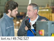 concept of people and woodwork apprenticeship. Стоковое фото, агентство Ingram Publishing / Фотобанк Лори