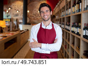 handsome sommelier in a wine shop or bar. Стоковое фото, агентство Ingram Publishing / Фотобанк Лори