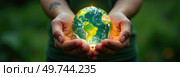 Glass glowing sphere of planet Earth In palms of hands is a ball with internal microclimate, caring for planet, clean environment, protecting ecology, geography, continents, travel. AI generated. Стоковое AI-изображение, AI-художник Ольга Симонова / Фотобанк Лори