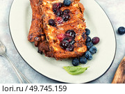 Barbecue pork spare loin ribs with blueberry sauce. American food. Grilled pork ribs with berry sauce. Стоковое фото, агентство Ingram Publishing / Фотобанк Лори