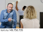 woman and man working together on project. Стоковое фото, агентство Ingram Publishing / Фотобанк Лори
