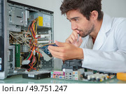 knowing the right motherboard components. Стоковое фото, агентство Ingram Publishing / Фотобанк Лори