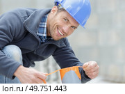 a worker assembly sewerage system. Стоковое фото, агентство Ingram Publishing / Фотобанк Лори