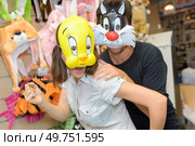 Man and woman in animal masks. Стоковое фото, агентство Ingram Publishing / Фотобанк Лори