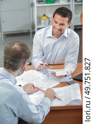 architect with a client during meeting. Стоковое фото, агентство Ingram Publishing / Фотобанк Лори