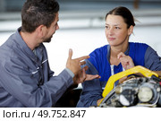 man and woman mechanics baffled work. Стоковое фото, агентство Ingram Publishing / Фотобанк Лори