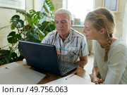 man in the office interviewing women for employment. Стоковое фото, агентство Ingram Publishing / Фотобанк Лори