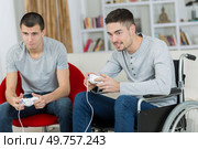 2 friends and video games. Стоковое фото, агентство Ingram Publishing / Фотобанк Лори