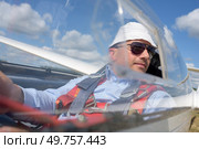 portrait of a pilot in glider. Стоковое фото, агентство Ingram Publishing / Фотобанк Лори