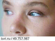 Hyper close-up of the blue eyes of a caucasian elegant woman looking aside. Close-up of the blue eyes of a caucasian elegant woman. Стоковое фото, агентство Ingram Publishing / Фотобанк Лори