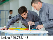 portrait of an apprentice male painters. Стоковое фото, агентство Ingram Publishing / Фотобанк Лори