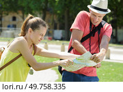 a frustrated couple arguing outdoors. Стоковое фото, агентство Ingram Publishing / Фотобанк Лори