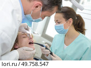 dentist female working with a patient. Стоковое фото, агентство Ingram Publishing / Фотобанк Лори
