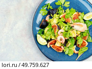 Delicious fresh salad with prawns, figs, avocado and herbs. Copy space.. Fresh shrimp avocado figs salad. Стоковое фото, агентство Ingram Publishing / Фотобанк Лори