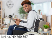 enthusiastic disabled man having a great morning. Стоковое фото, агентство Ingram Publishing / Фотобанк Лори