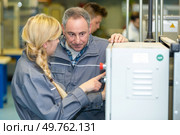 operating a cnc machining center machine. Стоковое фото, агентство Ingram Publishing / Фотобанк Лори