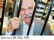 man trapped in prison concept. Стоковое фото, агентство Ingram Publishing / Фотобанк Лори