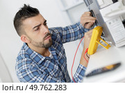 technician measuring devices. Стоковое фото, агентство Ingram Publishing / Фотобанк Лори