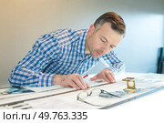 printing press worker at work. Стоковое фото, агентство Ingram Publishing / Фотобанк Лори