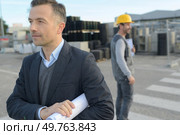 male supervisor walking away after meeting. Стоковое фото, агентство Ingram Publishing / Фотобанк Лори