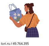 Young woman chooses bag in store. Girl holds summer bag in her hands standing isolated on white. Clothing care concept, womens wardrobe items and accessories. Ladys garment, elegance handbag. Young woman chooses bag in store. Girl holds blue bag in her hands standing isolated on white. Стоковая иллюстрация, агентство Ingram Publishing / Фотобанк Лори