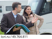 a businesswoman choosing a camping-car. Стоковое фото, агентство Ingram Publishing / Фотобанк Лори