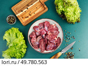 Raw venison or deer meat, exotic gourmet meat.. Raw deer venison prepared for a cooking process. Стоковое фото, агентство Ingram Publishing / Фотобанк Лори