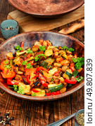 French vegetable dish, ratatouille. Baked eggplants, zucchini, peppers and tomatoes.. Ratatouille, french cuisine. Стоковое фото, агентство Ingram Publishing / Фотобанк Лори
