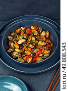 Fried mussels with spices and sauce. Seafood.. Fresh cooked mussels. Стоковое фото, агентство Ingram Publishing / Фотобанк Лори