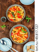 Minestrone soup with fresh vegetables and pasta. Italian minestrone soup on wooden. Стоковое фото, агентство Ingram Publishing / Фотобанк Лори