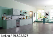 Spacious green kitchen hints openness and eco-friendly living 3D rendering.. Spacious kitchen with green cabinets. Стоковое фото, агентство Ingram Publishing / Фотобанк Лори