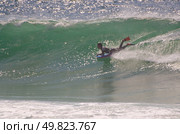 Body boarder riding a big wave. Стоковое фото, агентство Ingram Publishing / Фотобанк Лори